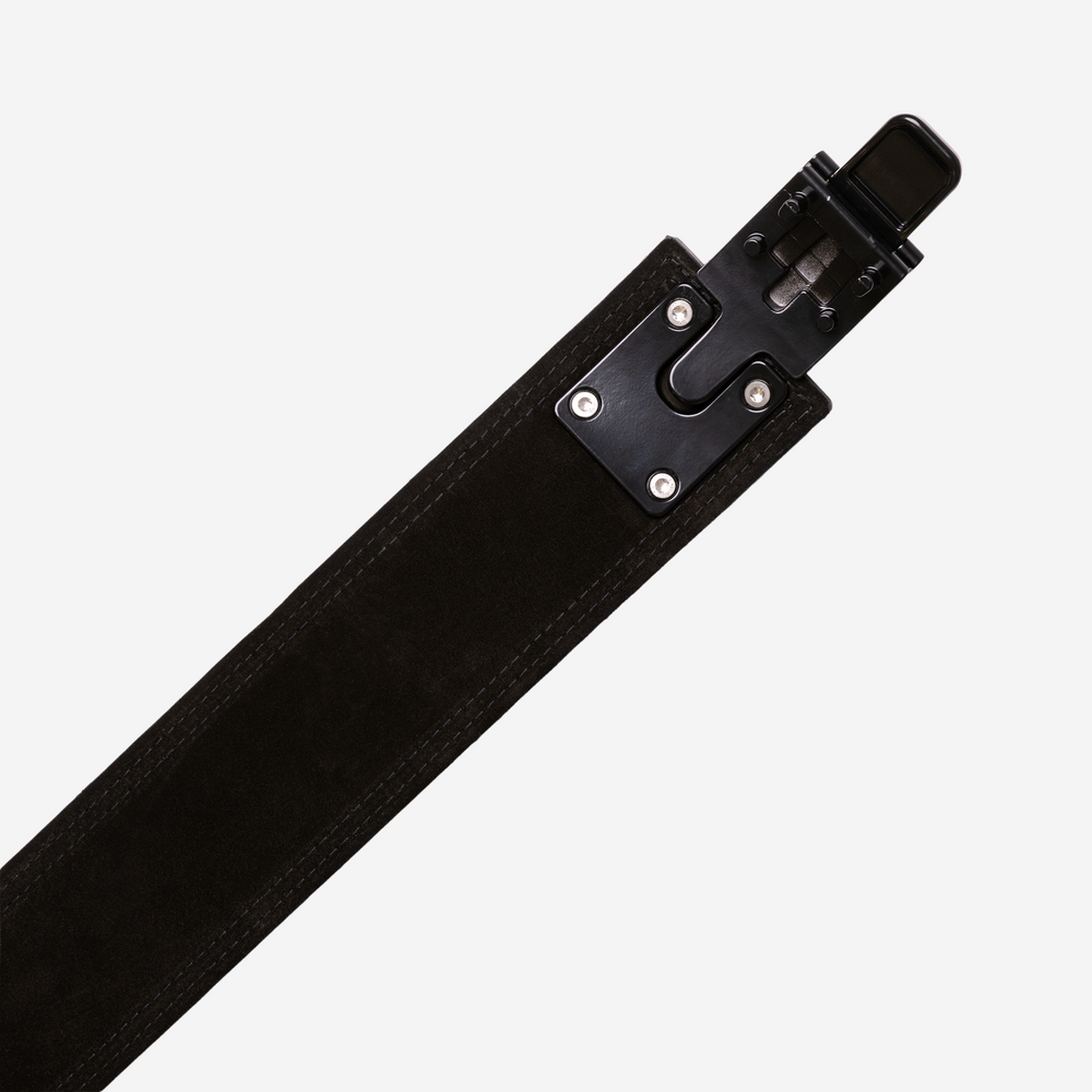 Black buckle on black suede