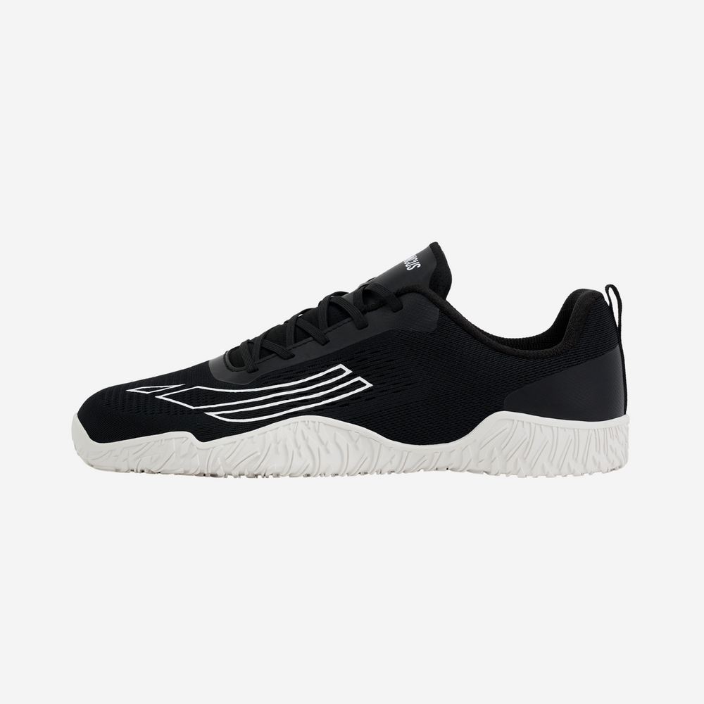 Black athletic shoe with white sole on a light gray background