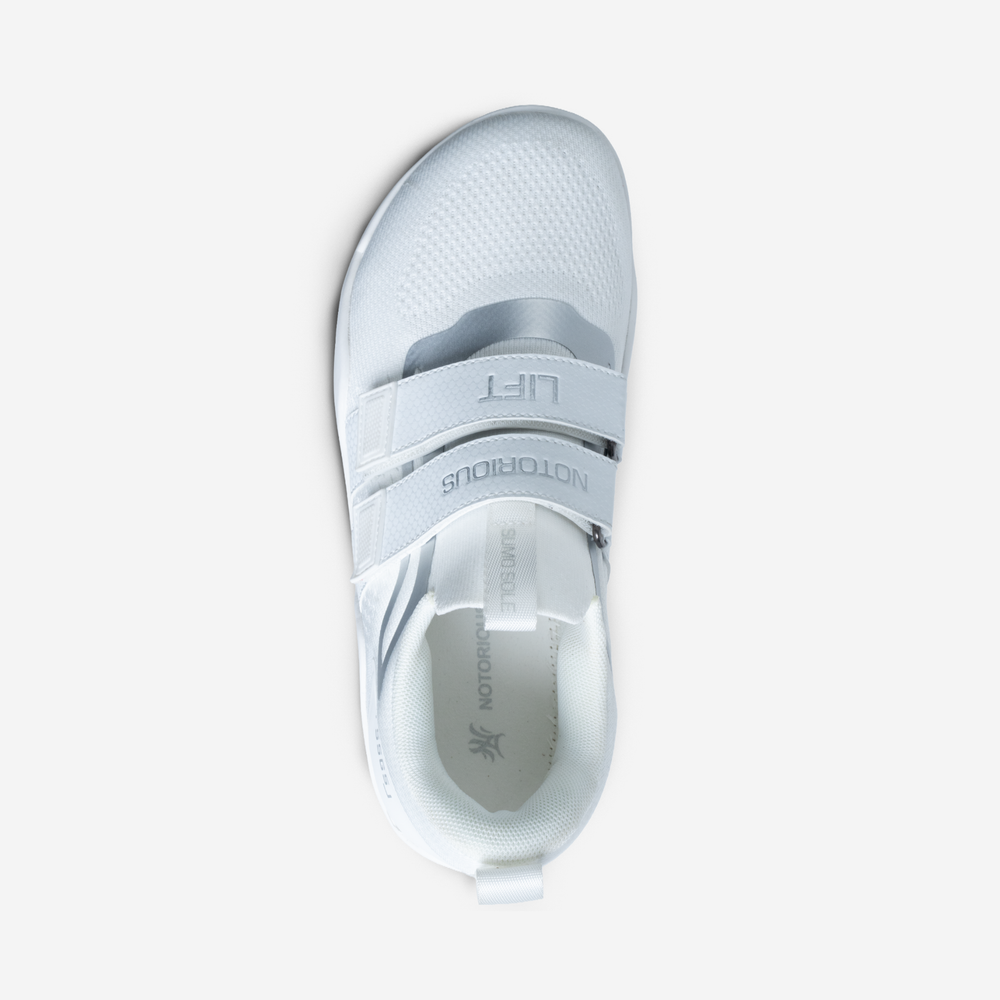 White athletic shoe on a light gray background